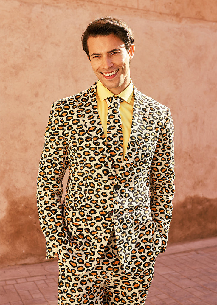 Man wearing the jag suit and yellow shirt