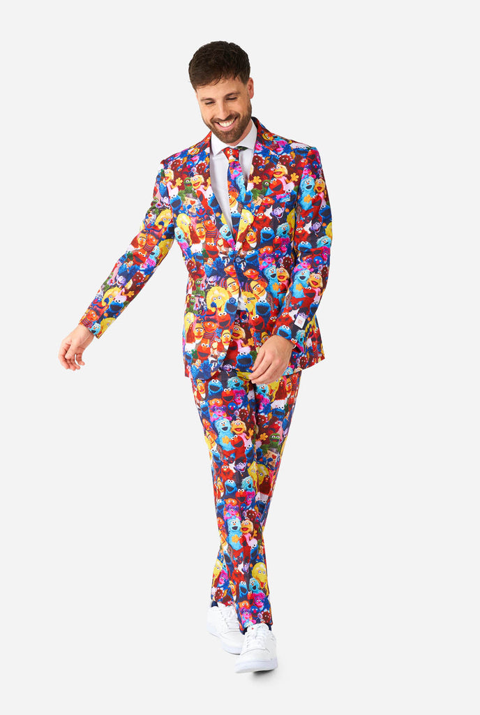 Man wearing men's suit with Sesame street characters print
