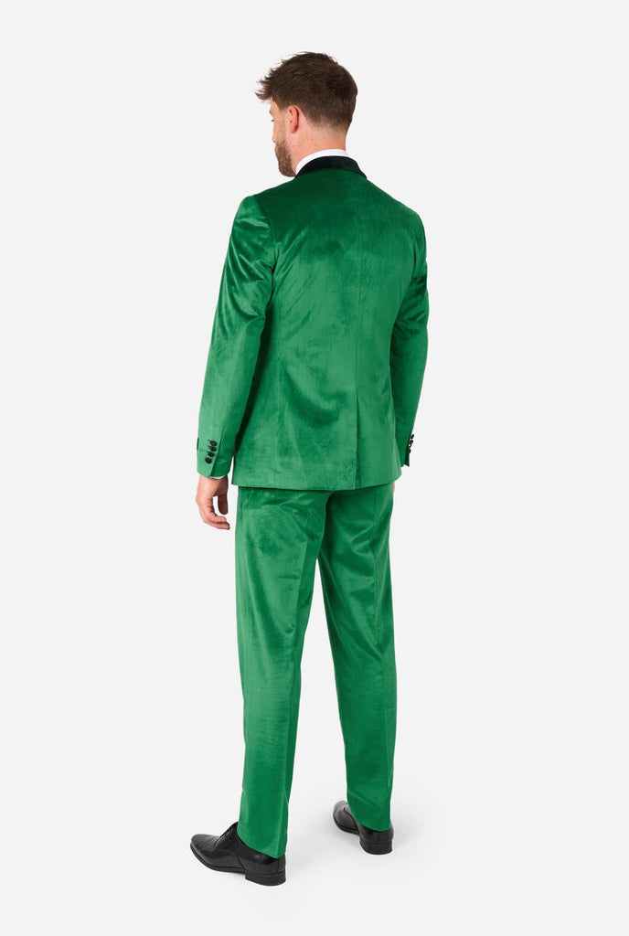 Man wearing St. Patrick's Day green velvet tuxedo, view from the back.