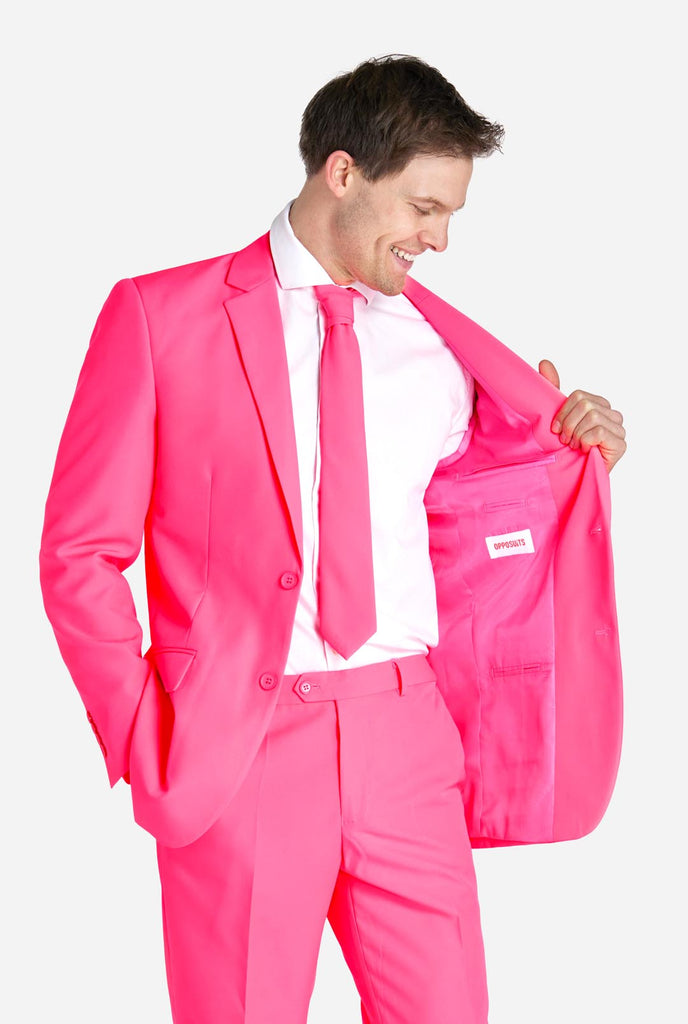 Man wearing neon pink men's suit